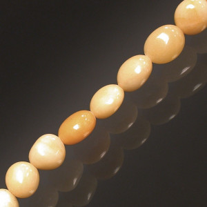 Collier calcite orange grains